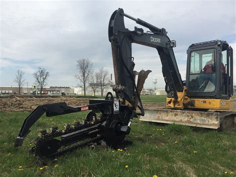 mini excavator vs trencher|grading with a mini excavator.